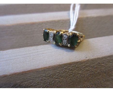 18ct Yellow gold ring set diamonds and green tourmalines 