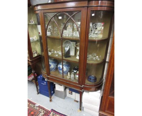 Edwardian mahogany satinwood and boxwood inlaid semi bow fronted display cabinet, the centre astragal glazed door flanked by 