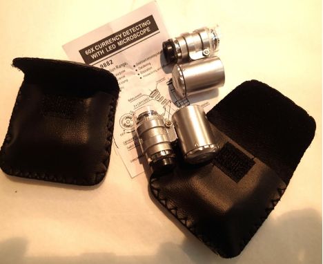 Two unused cased 60x jewellery/currency detecting loupes with LED light. P&amp;P Group 1 (£14+VAT for the first lot and £1+VA