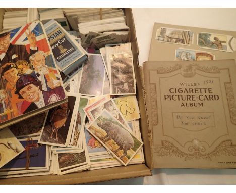 A box of mixed cigarette and playing cards to include Players Navy Cuts, Capstan, Piccadilly and others. P&amp;P Group 1 (£14