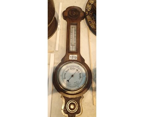 Early 20th century barometer/thermometer in oak case. Not available for in-house P&amp;P, contact Paul O'Hea at Mailboxes on 