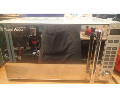 Russell Hobbs stainless steel kitchen microwave. Not available for in-house P&P, contact Paul O'Hea at Mailboxes on 01925 659