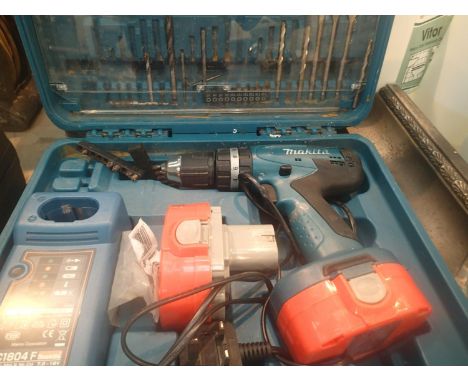 Makita 18v battery drill with two batteries and charger. Not available for in-house P&P, contact Paul O'Hea at Mailboxes on 0