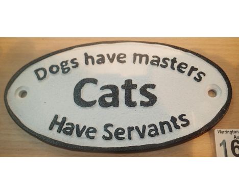 Cast iron Dogs Have Masters Cats Have Servants sign, L: 18 cm. P&amp;P Group 1 (£14+VAT for the first lot and £1+VAT for subs