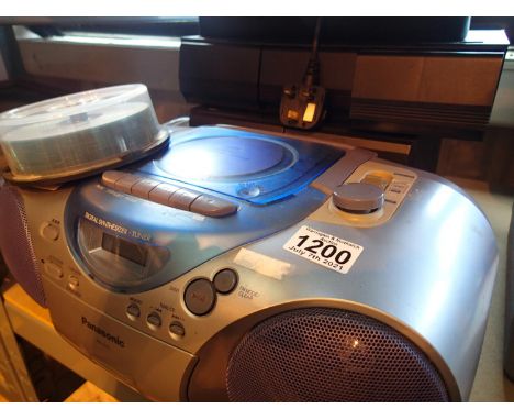 Panasonic boombox and a collection of music cassettes. Not available for in-house P&P, contact Paul O'Hea at Mailboxes on 019