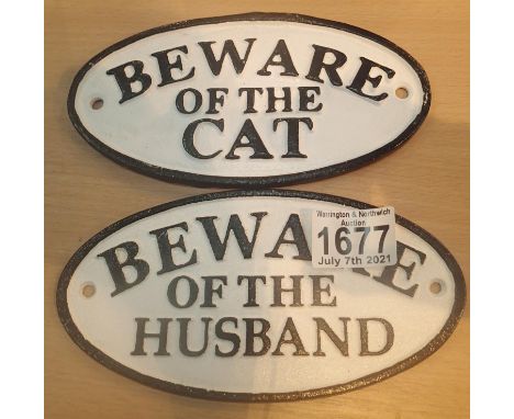 Two cast iron signs; Beware of the Cat and Beware of the Husband, L: 18 cm. P&amp;P Group 1 (£14+VAT for the first lot and £1