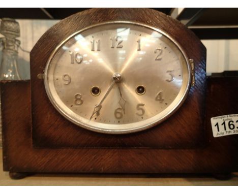 Oak cased chiming mantel clock with oval face. Not available for in-house P&P, contact Paul O'Hea at Mailboxes on 01925 65913