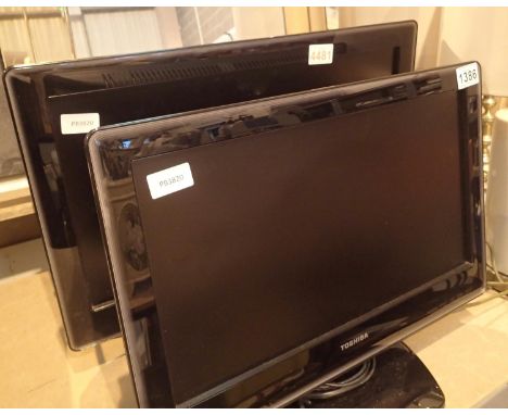 Two Toshiba computer monitors, different sizes. Not available for in-house P&P, contact Paul O'Hea at Mailboxes on 01925 6591