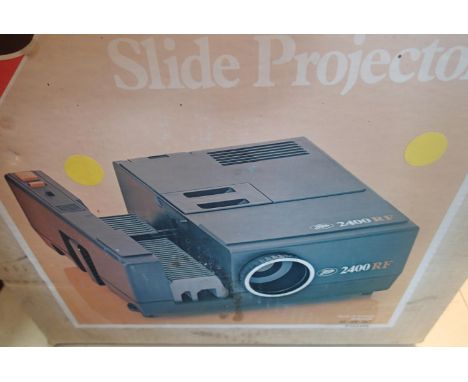 2400 RF slide projector. Not available for in-house P&amp;P, contact Paul O'Hea at Mailboxes on 01925 659133 