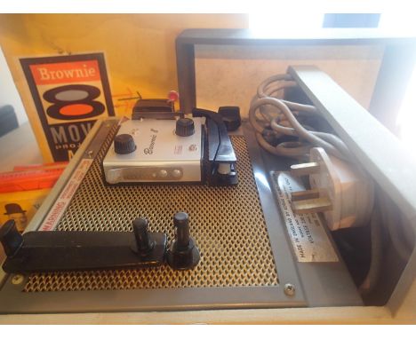 Brownie eight movie projector with films. Not available for in-house P&amp;P, contact Paul O'Hea at Mailboxes on 01925 659133