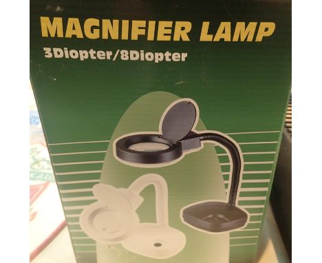 Boxed magnifier lamp. P&amp;P Group 2 (£18+VAT for the first lot and £3+VAT for subsequent lots) 
