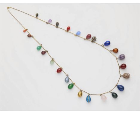 Kette mit farbigen Ei-Anhängern14 kt Gelbgold, Silber. An feine goldene Ankerkette mittels Silber-/Goldringen im Verlauf ange