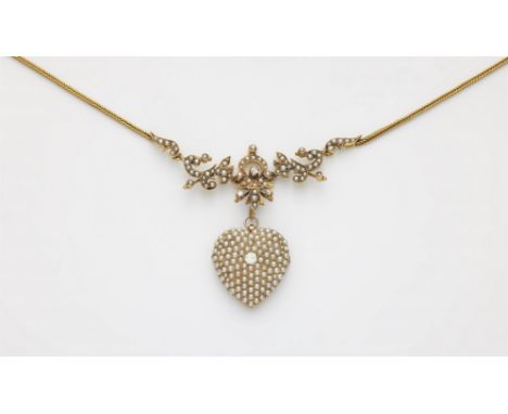 Collier mit Herzanhänger14 kt Gelbgold. Fuchsschwanzkette mit Stabschließe. Mittig eingefügtes historisierendes Motiv und var