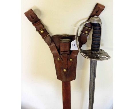 An 1892 pattern Victorian British Infantry Officer's sword with gothic steel hilt, plain piped blade in leather scabbard.