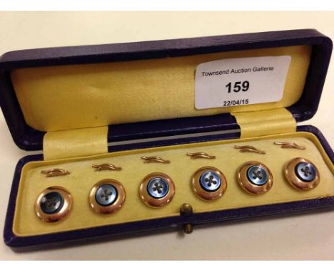 A set of 6 vintage gilt buttons with blue centres, in a fitted box.
