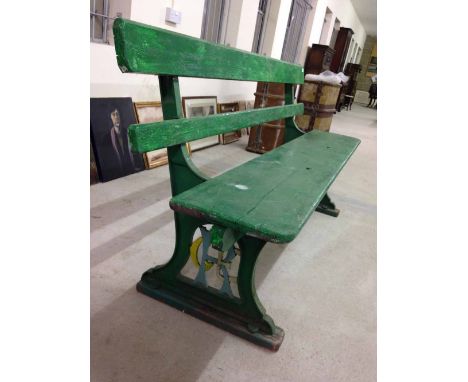 A vintage Great Eastern Railway platform seat, cast iron ends with GER initials, one piece wooden seat with 2 wooden slats to