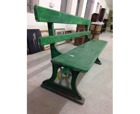 A vintage Great Eastern Railway platform seat, cast iron ends with GER initials, one piece wooden seat with 2 wooden slats to