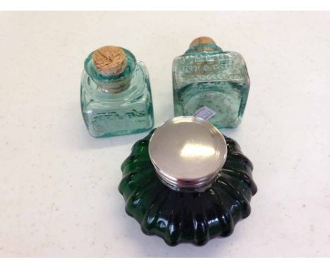 A pair of vintage Fields's Ink and Gum glass bottles. Rd No. 660694. Suitable for writing slopes with a moulded green glass i