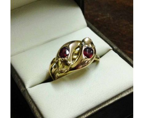 Antique 9ct gold twin headed serpent ring set with 2 0.3ct rubies. Hallmarked Chester 1914. Maker JHW, Size P&frac12;, Weight