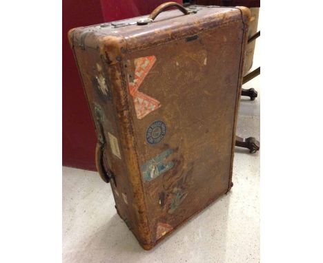 A c1920-30s leather gentleman's travelling wardrobe/suitcase with fitted interior and coathangers, with vintage aeroplane lug