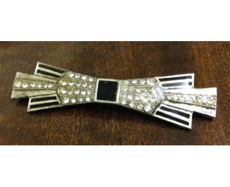 A silver Art Deco brooch with geometric shape laid out in diamante and black enamel. No hallmark (tests as silver).