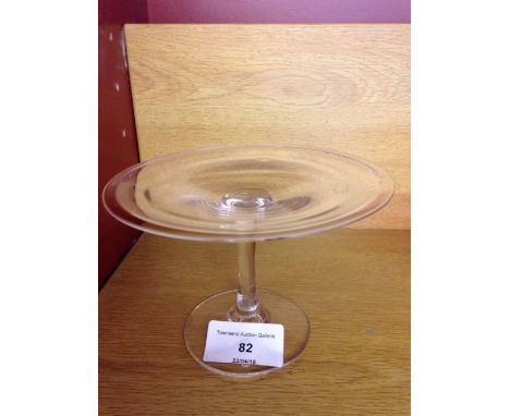 A Georgian glass patch stand. Top 12.5cm diameter. Base 6.75cm diameter and 7.5cm tall. With pontil mark to base. No clips, c