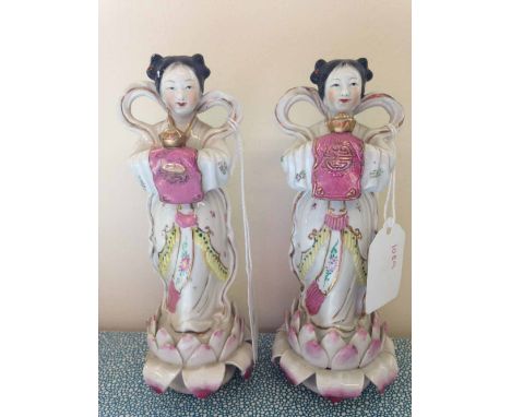 2 late 19th/early 20th century Chinese ceramic girl figures supported on Lotus flowers (flowers a/f) 16cm tall.