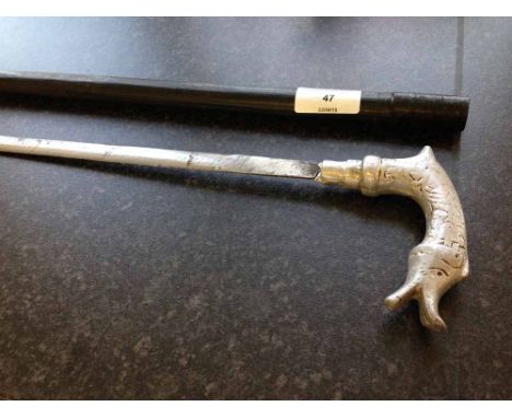 A 19th century sword stick with pewter/white metal dolphin shaped handle.