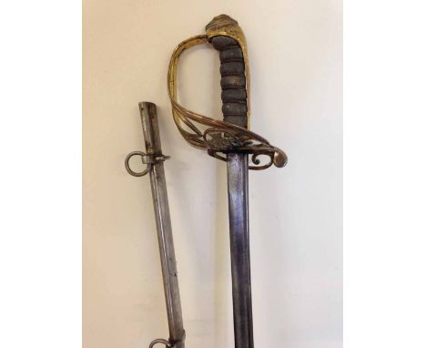 An 1822 pattern William IV British Infantry Officer's sword with brass gothic hilt with fold-down guard, slightly curved blad