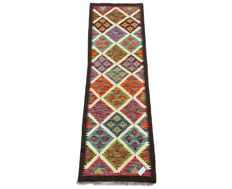 Maimana Kilim runner, decorated with geometric medallionsDimensions: Length/Width:&nbsp;195cm&nbsp; Depth/Diameter:&nbsp;64cm