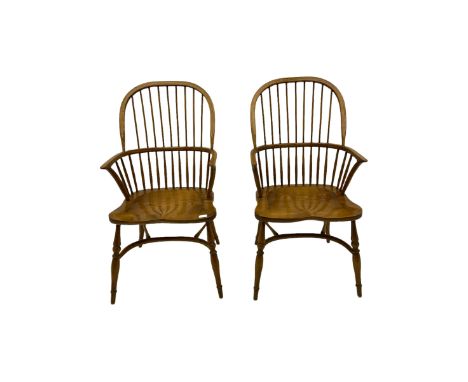 Pair of light elm Windsor armchairs, stick and hoop back, crinoline stretcher baseDimensions: Length/Width:&nbsp;54cm&nbsp; D