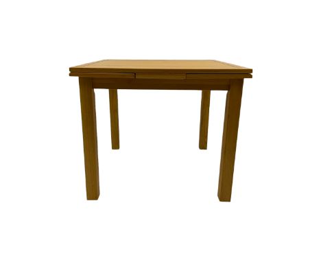 Light oak square extending dining table,  two pull out leavesDimensions: Height:&nbsp;77cm&nbsp; Length/Width:&nbsp;90cm&nbsp