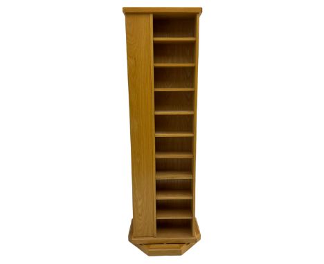 Light oak revolving CD storage trinket tower, adjustable shelvesDimensions: Height:&nbsp;161cm&nbsp; Length/Width:&nbsp;47cm&