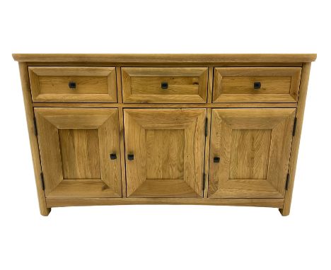 Solid light oak sideboard, fitted with three drawers and three cupboardsDimensions: Height:&nbsp;82cm&nbsp; Length/Width:&nbs