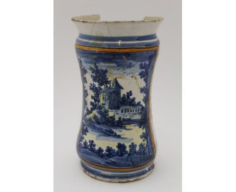An 18th century Italian tin-glazed earthenware albarello, blue painted landscape decoration, inscribed 'G.B.N. 1765', 17.5cm 