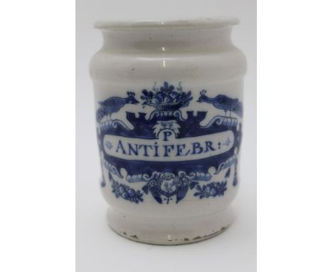 An 18th century Italian tin-glazed earthenware albarello, blue painted decorative cartouche with peacocks, putti mask &amp; b