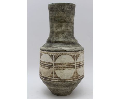 A Troika pottery vase of 'urn' form, painted with circles in squares to the body, painted to the base 'Troika' and artists, m