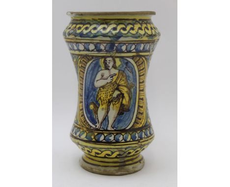 A 17th century Italian tin-glazed earthenware albarello, blue & ochre painted decoration, two panels, one on either side of a