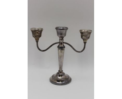 P H Vogal &amp; Co A silver twin branch, three light candelabra, Birmingham 1976, 22.5cm high 