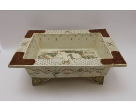 A Japanese Satsuma rectangular earthenware trough, painted & gilded Bijin decoration to the sole, moulded with peonies to the