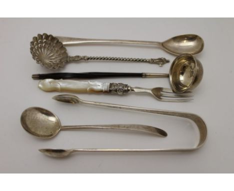 Chawner &amp; Co. A pair of silver sugar tongs, engine turned decoration, London 1859, a Victorian silver sifting ladle with 