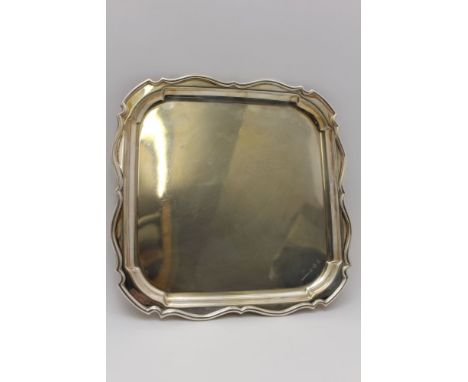F.Hawker Carpathian Silver Co. Ltd., a square form silver salver tray with piecrust rim, Birmingham 1938, 32cm square, 1009g 