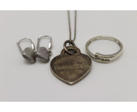 A 9ct white gold ring inset diamonds, together with a 'Tiffany &amp; Co', New York' heart pendant on chain &amp; a pair of si