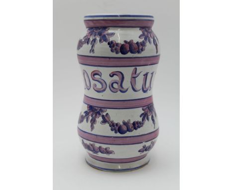 A 19th century French glazed terracotta albarello, pink &amp; blue painted decoration of flowers &amp; fruit swags amidst ban