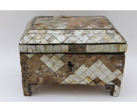 An 18th century table casket, mother of pearl parquetry overlaid, hinged cover opens to reveal fabric lined interior, with mi