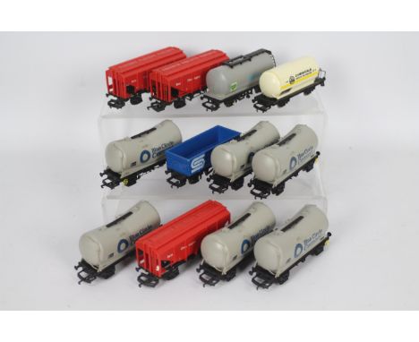 Hornby - Lima - 12 x unboxed wagons including six Depressed Centre tank wagons in Blue Circle Cement livery, three Grain Hopp