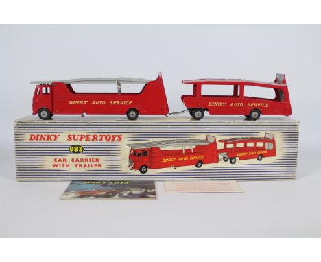 Dinky - A boxed Dinky # 983 Car Carrier With Trailer. This is unsold stock from a long closed shop and has been in storage fo