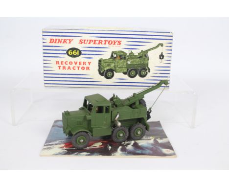 Dinky - A boxed # 661 Military Recovery Tractor. This is unsold stock from a long closed shop and has been in storage for a l