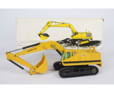 NZG - A boxed CAT 245 Hydraulikbagger excavator in 1:50 scale. # 160. The model appears Near Mint with only some minor marks 