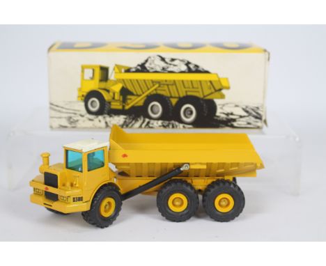 NZG - A boxed DJB D300 Knickgelenkter Muldenkipper dumper truck in 1:50 scale. # 166. The model appears Near Mint with only s